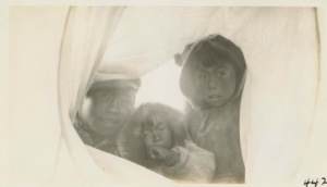 Image of Eskimo [Inuit] boys looking into my tent
